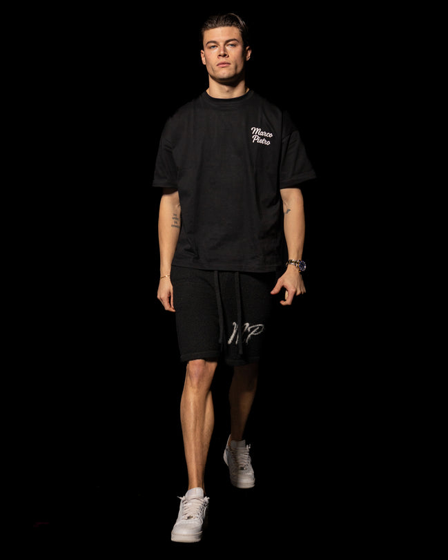 Black original logo knitted shorts
